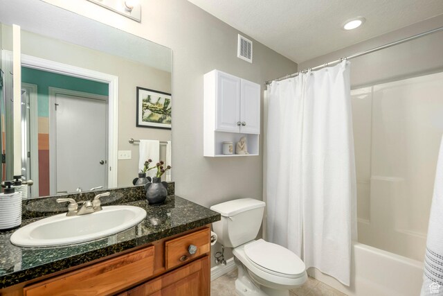 full bathroom with toilet, tile patterned flooring, vanity, shower / bath combo, and recessed lighting