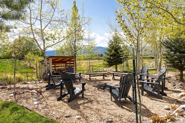 1920 S Wall St, Heber City, UT 84032 - view of yard featuring a fire pit and a mountain view