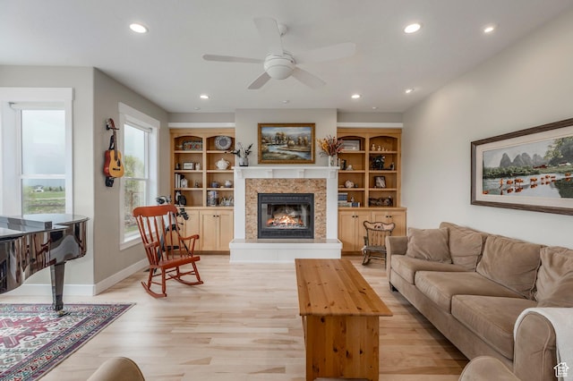1920 S Wall St, Heber City, UT 84032 - living room with recessed lighting, light wood-style flooring, a fireplace, ceiling fan, and baseboards