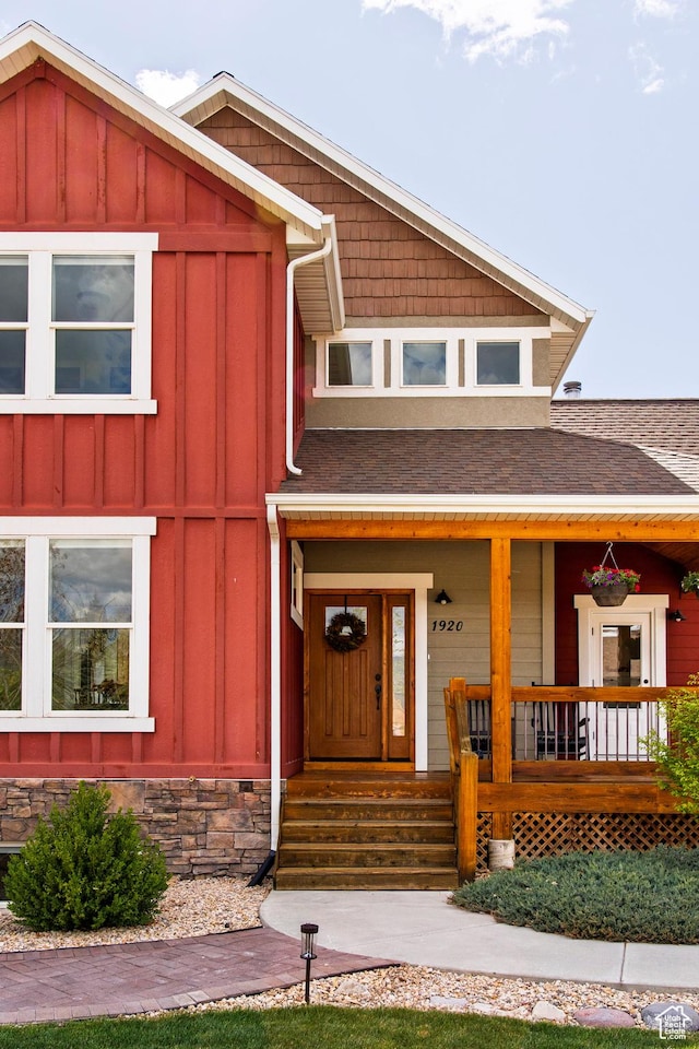 1920 S Wall St, Heber City, UT 84032 - view of front of property with board and batten siding, a shingled roof, and a porch