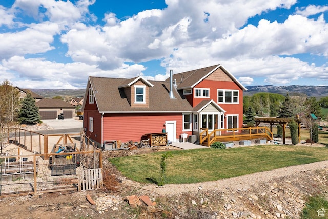 1920 S Wall St, Heber City, UT 84032 - rear view of property featuring a deck, a gate, a shingled roof, and a pergola