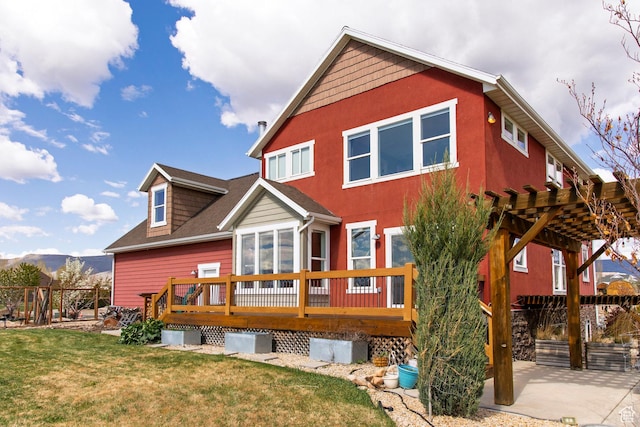 1920 S Wall St, Heber City, UT 84032 - back of house featuring a deck with mountain view, a pergola, a lawn, and roof with shingles
