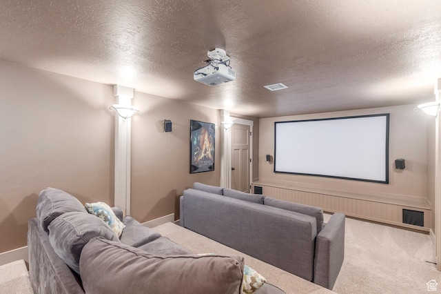 1920 S Wall St, Heber City, UT 84032 - carpeted cinema room featuring baseboards and a textured ceiling