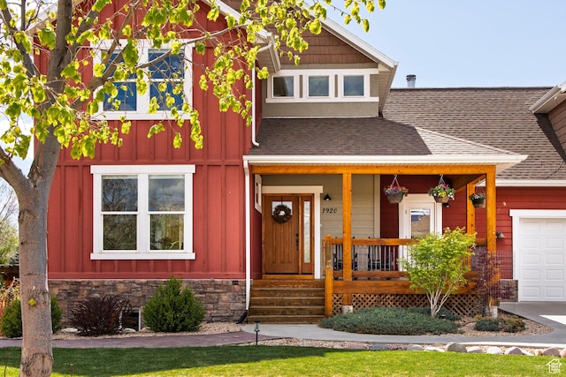 1920 S Wall St, Heber City, UT 84032 - view of front of property featuring board and batten siding, a shingled roof, a porch, and an attached garage