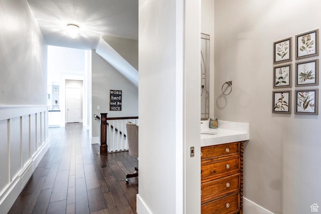 5314 W Rolling Brook Dr, Herriman, UT 84096 - hall featuring an upstairs landing, dark wood-style floors, and baseboards