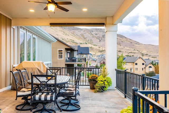 5314 W Rolling Brook Dr, Herriman, UT 84096 - balcony with ceiling fan, a mountain view, a residential view, and outdoor dining area