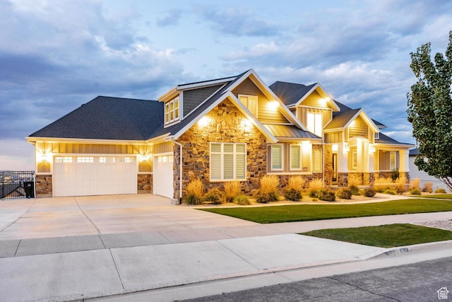 5314 W Rolling Brook Dr, Herriman, UT 84096 - craftsman-style home with board and batten siding, stone siding, a garage, concrete driveway, and a front yard