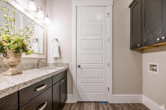 5314 W Rolling Brook Dr, Herriman, UT 84096 - bathroom featuring wood finished floors, baseboards, and vanity