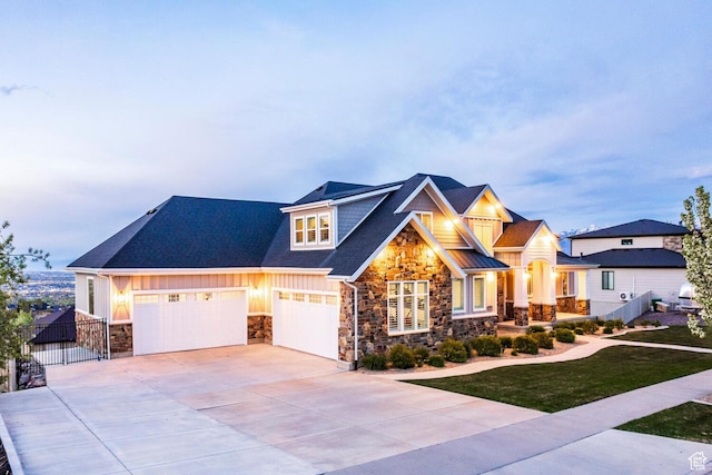 5314 W Rolling Brook Dr, Herriman, UT 84096 - craftsman inspired home with stone siding, board and batten siding, concrete driveway, fence, and a gate