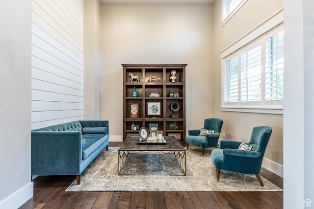 5314 W Rolling Brook Dr, Herriman, UT 84096 - living area with wood finished floors, baseboards, and a towering ceiling