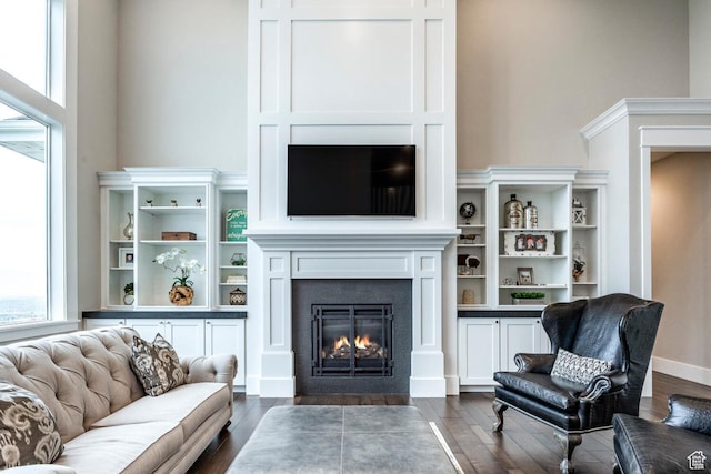 5314 W Rolling Brook Dr, Herriman, UT 84096 - living area with a fireplace with flush hearth and dark wood finished floors