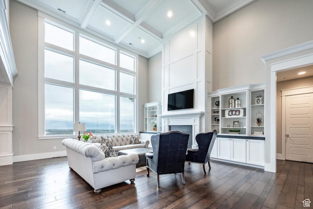 5314 W Rolling Brook Dr, Herriman, UT 84096 - living area featuring a towering ceiling, plenty of natural light, ornamental molding, a fireplace, and dark wood-style floors
