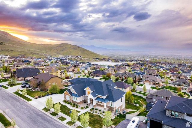 5314 W Rolling Brook Dr, Herriman, UT 84096 - aerial view of property and surrounding area with nearby suburban area and a mountainous background