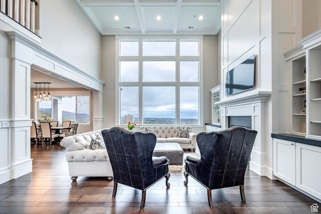 5314 W Rolling Brook Dr, Herriman, UT 84096 - living area featuring a high ceiling, dark wood-style flooring, a fireplace, recessed lighting, and beam ceiling