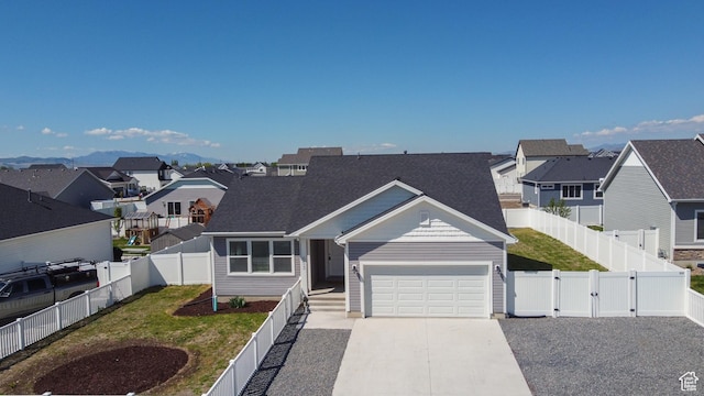 view of front of property with a residential view, a garage, concrete driveway, a gate, and a shingled roof