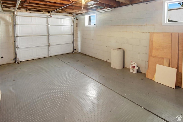 garage with concrete block wall