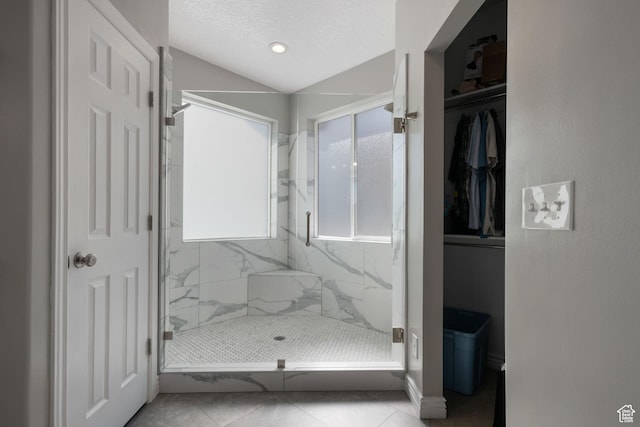 14038 S New Saddle Rd, Draper, UT 84020 - full bath featuring a marble finish shower, tile patterned flooring, recessed lighting, a walk in closet, and baseboards
