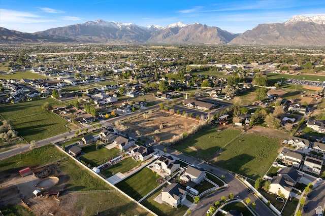 aerial overview of property's location with nearby suburban area and mountains