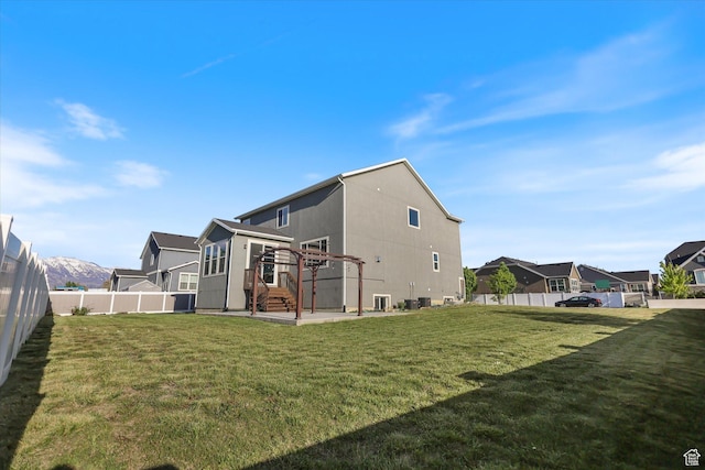 rear view of property featuring a residential view and a patio area