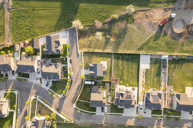 aerial view of property's location featuring nearby suburban area