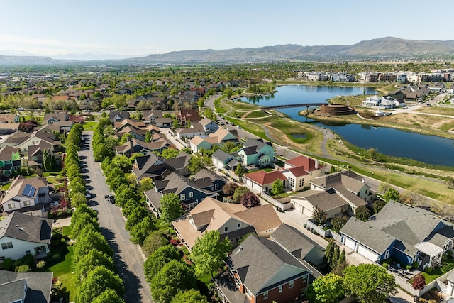 aerial view of residential area with a water and mountain view