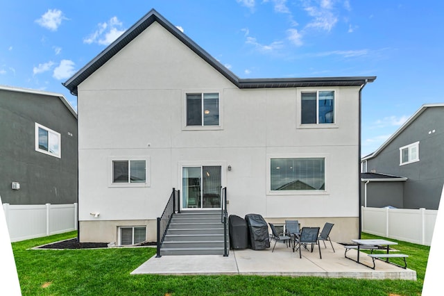 2607 N Mclaws Ave, Layton, UT 84040 - back of house with stucco siding and a patio