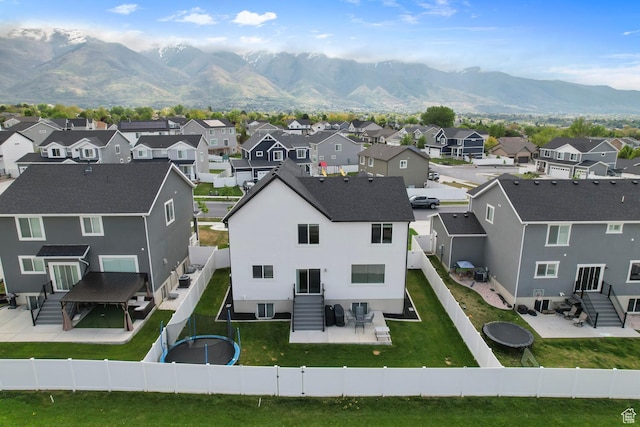 2607 N Mclaws Ave, Layton, UT 84040 - aerial perspective of suburban area with a mountainous background