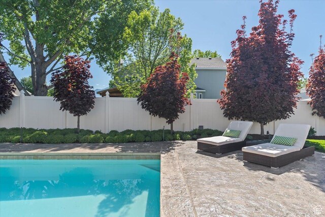 10543 S 2330 W, South Jordan, UT 84095 - view of pool featuring a fenced backyard and a patio area