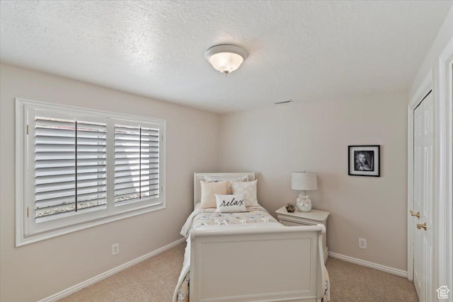 10543 S 2330 W, South Jordan, UT 84095 - bedroom featuring carpet floors, baseboards, and a textured ceiling