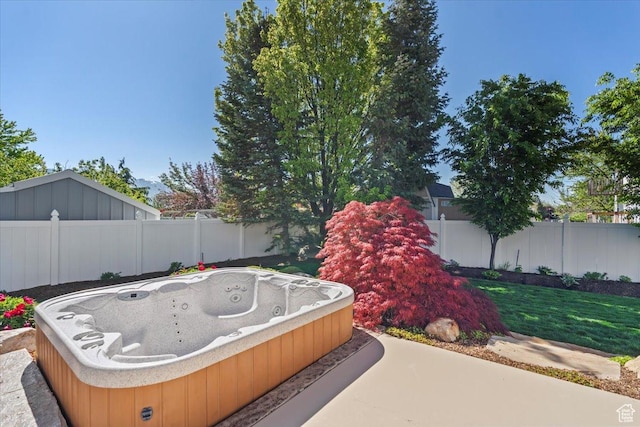 10543 S 2330 W, South Jordan, UT 84095 - view of patio / terrace featuring an outdoor hot tub and a fenced backyard