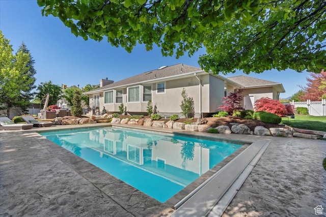 10543 S 2330 W, South Jordan, UT 84095 - view of swimming pool with fence and a patio