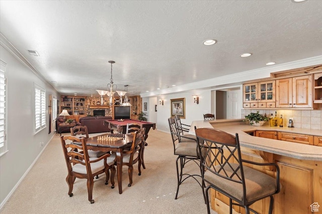 10543 S 2330 W, South Jordan, UT 84095 - dining room with ornamental molding, baseboards, light carpet, a chandelier, and a textured ceiling