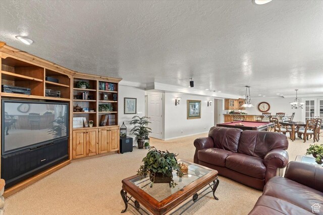 10543 S 2330 W, South Jordan, UT 84095 - living area featuring light carpet, a textured ceiling, ornamental molding, and baseboards