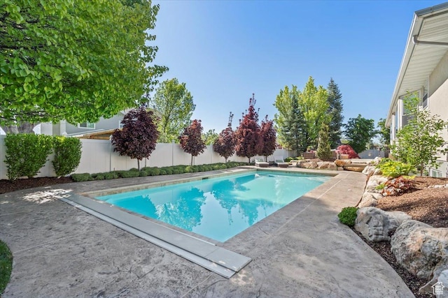 10543 S 2330 W, South Jordan, UT 84095 - view of swimming pool with a fenced backyard and a patio
