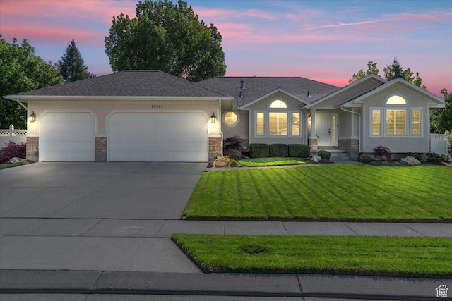10543 S 2330 W, South Jordan, UT 84095 - single story home featuring a garage, driveway, a yard, and stucco siding