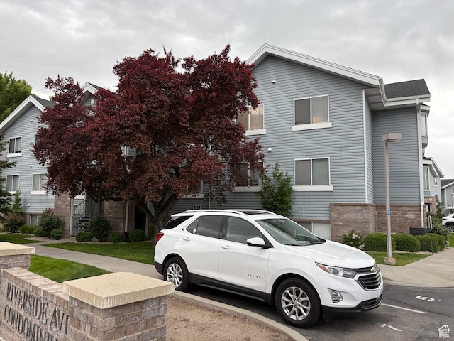 1559 N Riverside Ave Unit 9, Provo, UT 84604 - view of home's exterior featuring brick siding