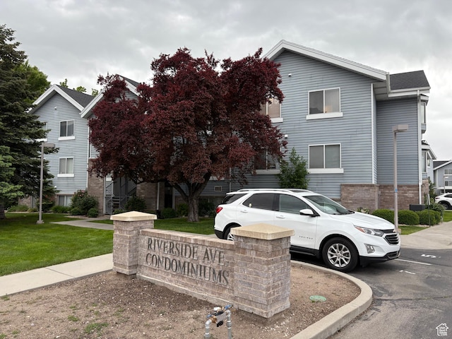 1559 N Riverside Ave Unit 9, Provo, UT 84604 - view of property hidden behind natural elements with a front yard