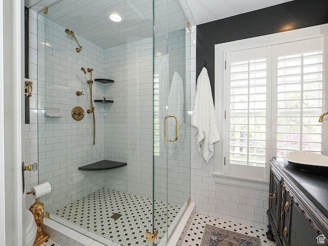 1133 S 1400 E, Salt Lake City, UT 84105 - full bath with a stall shower, vanity, tile patterned floors, and toilet