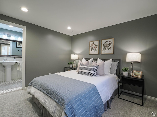 1133 S 1400 E, Salt Lake City, UT 84105 - carpeted bedroom with baseboards, a sink, recessed lighting, and ensuite bath