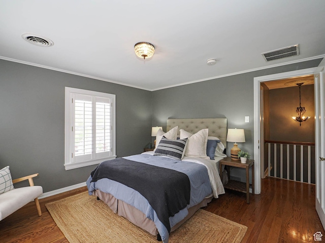 1133 S 1400 E, Salt Lake City, UT 84105 - bedroom with wood finished floors, crown molding, and baseboards