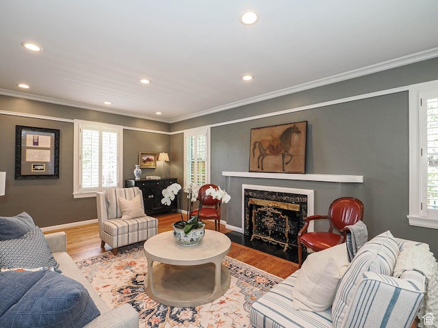 1133 S 1400 E, Salt Lake City, UT 84105 - living area featuring plenty of natural light, wood finished floors, baseboards, recessed lighting, and crown molding