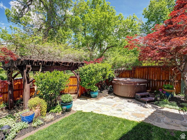 1133 S 1400 E, Salt Lake City, UT 84105 - fenced backyard with a hot tub and a patio area
