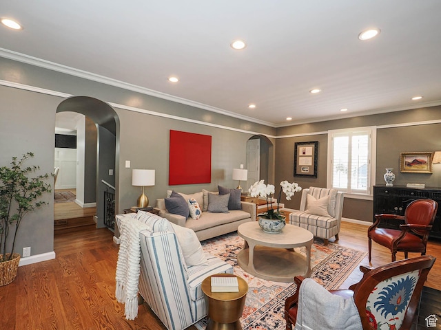 1133 S 1400 E, Salt Lake City, UT 84105 - living room with arched walkways, wood finished floors, baseboards, crown molding, and recessed lighting