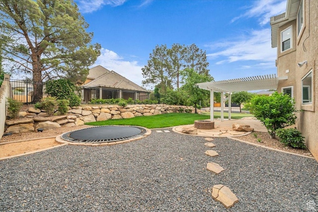 1659 S Cobblestone Ln, St George, UT 84790 - fenced backyard featuring a pergola, an outdoor fire pit, and a patio area