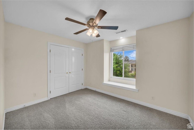 1659 S Cobblestone Ln, St George, UT 84790 - unfurnished bedroom featuring carpet, baseboards, a closet, and ceiling fan