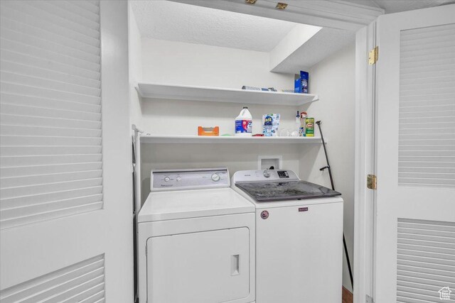 1659 S Cobblestone Ln, St George, UT 84790 - washroom featuring washing machine and dryer and a textured ceiling
