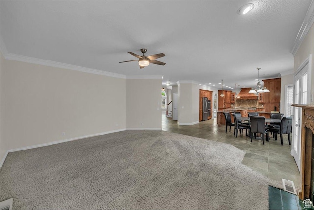 1659 S Cobblestone Ln, St George, UT 84790 - living area featuring baseboards, crown molding, a ceiling fan, and recessed lighting