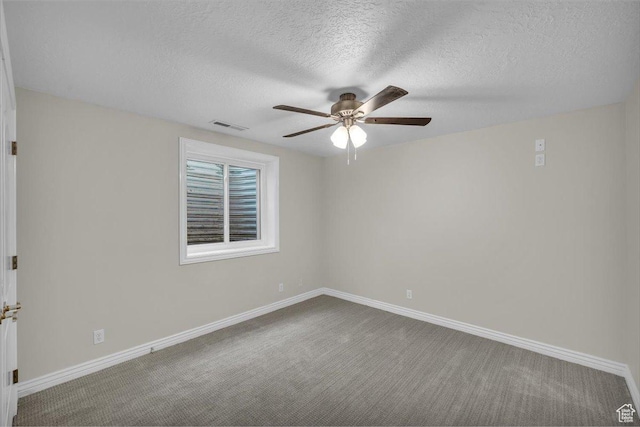 1659 S Cobblestone Ln, St George, UT 84790 - carpeted spare room with ceiling fan, a textured ceiling, and baseboards