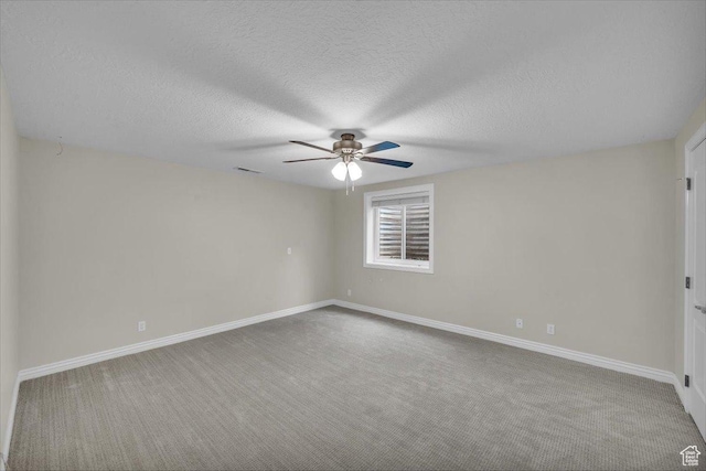 1659 S Cobblestone Ln, St George, UT 84790 - spare room with ceiling fan, carpet flooring, baseboards, and a textured ceiling