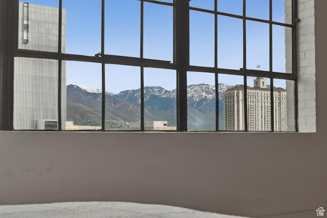 unfurnished bedroom with a mountain view
